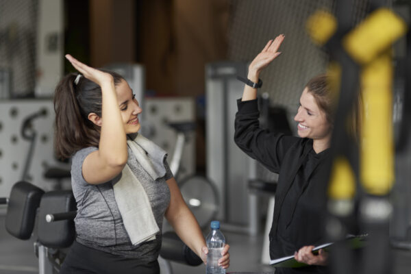 friends working out, high-five